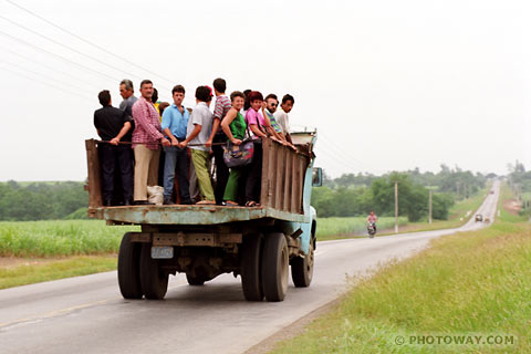 image Transportation in Cuba people transport in truck beds transports Cuba