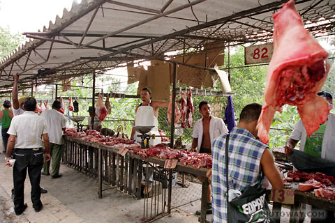 image Photos of markets in Cuba photo of Cuban market butcher shop photo