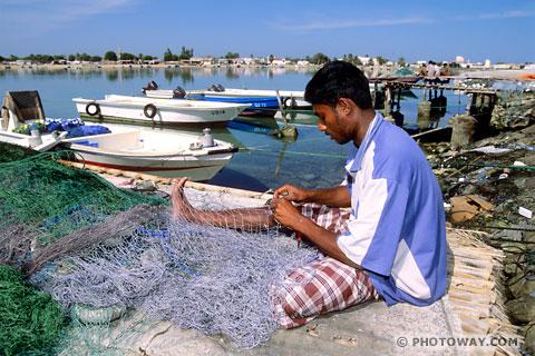 Image Indian fisherman photo of nets photos of an Indian fisherman