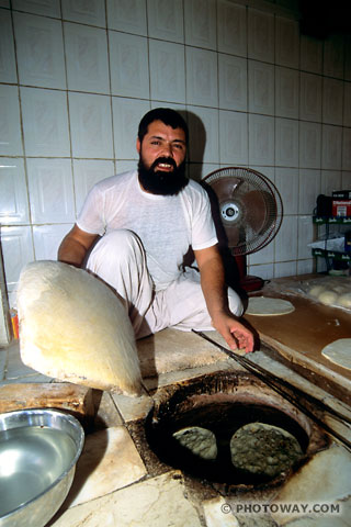 Image Photo of bread Cooking photos of Arab bread wafers cooking in oven